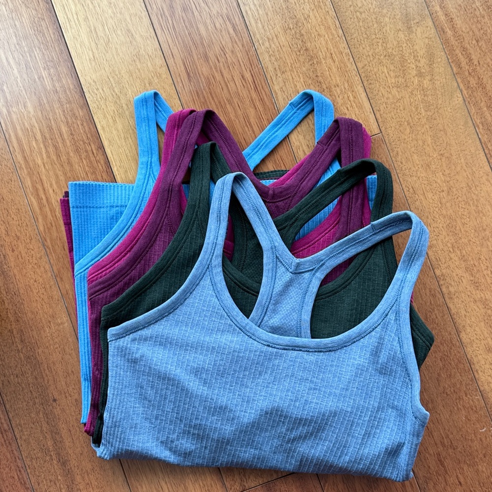 SOLD
AWESOME DEAL!! Perfect condition!
5 Lululemon Ebb to Street Tank Tops